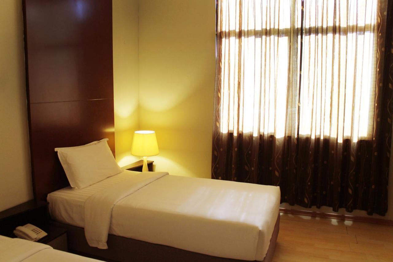 Ginasuite Kompleks27 Hotel Бандар Сери Бегаван Стая снимка